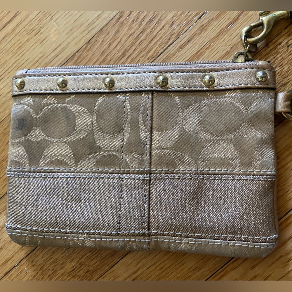 Coach wristlet with studs